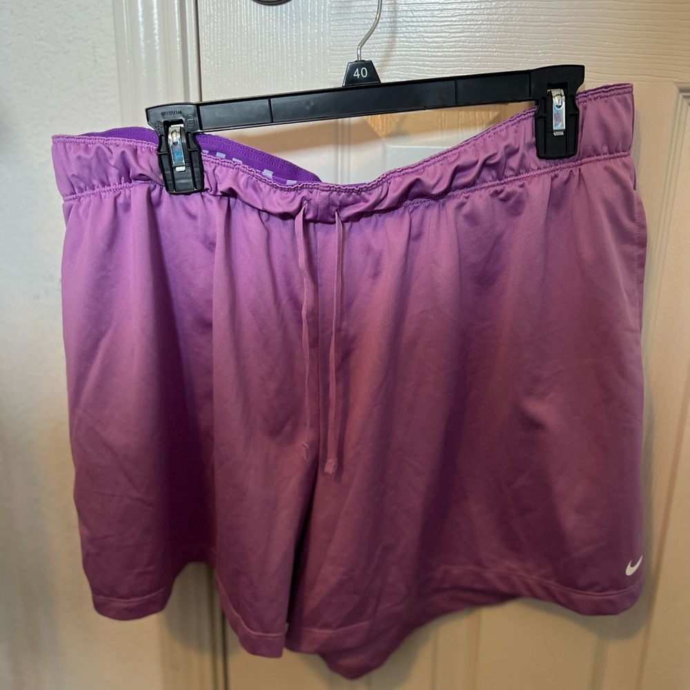 Nike Woman’s 1X Dri-Fit Workout shorts. Light purple. 100% Polyester